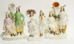 Two Staffordshire flatback spill vases of Robin Hood and another of man and woman (3)