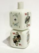 Three items of crested china and a glass bottle in the form of two stacked cubes decorated with