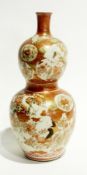 Japanese Kutani vase, gored-shape, decorated in typical pallet, with birds amongst blossom branches,