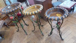 Set of three graduated hammered and painted metal jardiniere stands, each with removable bowl, on