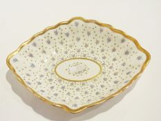19th century Derby porcelain dish, elliptical-shaped with gilt borders and painted with lavender