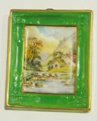 Royal Crown Derby china plaque, painted with view of Lathkill Dale, cottage on river bank, signed "W