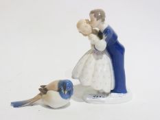 Royal Copenhagen Bing & Grondahl porcelain model of a girl and boy kissing, 20cm high and a model of