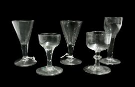 Old English wine glass with knopped stem, raised on a circular folded foot, together with another