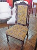 Victorian rosewood hall chair having floral and foliate scroll carved top rail, turned step finials,