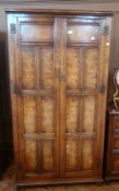 Reproduction figured elm and oak three drawer chest with brass loop handles and pierced