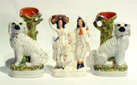 Pair of Staffordshire dog spill vases ( one af) and a flat back of man and woman 33 cms high (3)