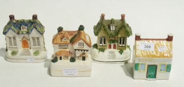 Staffordshire cottage as pastille burner and three further cottages as money boxes (4)