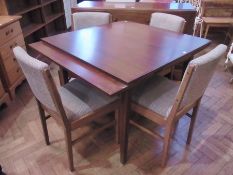 Mid 20th century Gordon Russell walnut dining room suite viz:- sideboard with four drawers and two