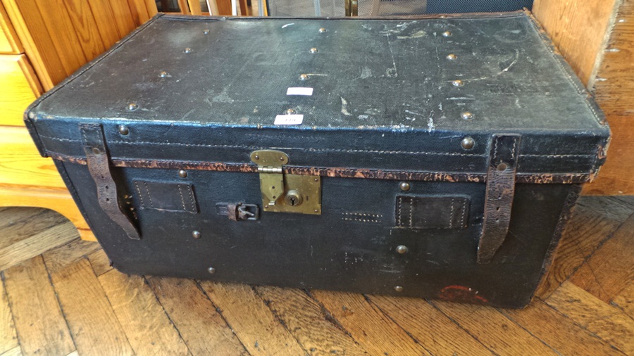 Antique brass studded leather-bound travelling trunk with brass lock