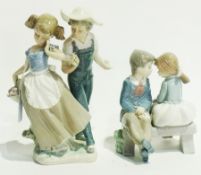 Lladro porcelain model of a girl and boy, 23cm high (af) and a similar Nao model of a girl and boy