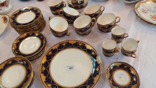 Mintons part tea and coffee service, royal blue and ornate gilt border on white ground