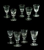 Nine old English wine glasses, with faceted cut trumpet bowls, knopped stems, on circular foot (9)