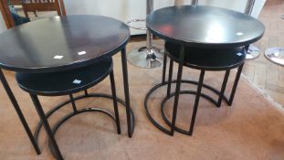 Pair Conran black metal circular occasional tables with matching smaller pair