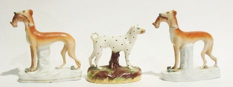 Pair of Staffordshire greyhounds with rabbits in their mouths, 20cm high and a model of a