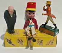 A Pelham's puppet, boxed, together with a Johnny Walker Scotch Whisky advertising figure and a