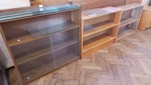 Glazed three-tier bookcase and two two-tier bookcases