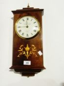 A Knight and Gibbons mahogany cased wall clock, quartz movement, height 47cms together with a