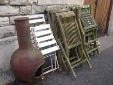 Six folding wooden garden chairs, two metal and wood garden folding chairs and a chiminea