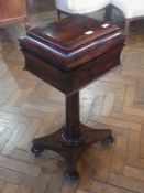 Regency rosewood sewing box/teapoy having sarphogus-shaped top, on cylinder column and concave