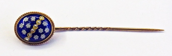 Gold-coloured metal and enamel stick pin