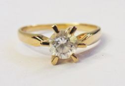 Gold and zircon solitaire ring and a pla