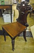 Pair Regency mahogany hall chairs, each