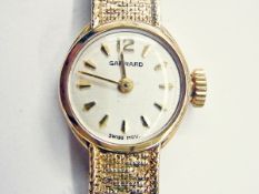 Garrard 9ct gold lady's cocktail watch,