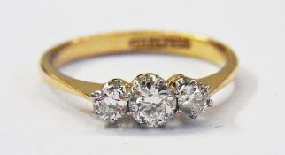 18ct gold three-stone diamond ring, appr