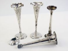 Four silver trumpet-shaped flower vases,