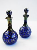 Pair glass scent bottles overlaid in sil