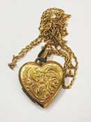 Gold plated heart-shaped locket with eng