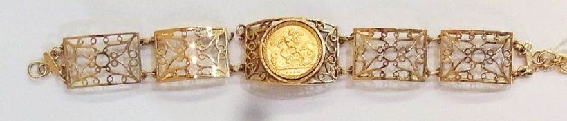 A 9ct gold filigree linked bracelet set a George I 1910 half-sovereign, 22.7g