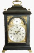 A 19th century ebonised bracket clock having an engraved steel dial with silvered chapter ring,