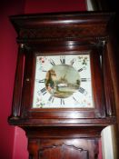 A late 18th century oak cased longcase clock, the hood with flat dentil mould cornice over blind