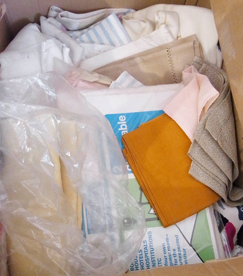 A large quantity of assorted linen (1 box and 3 rolls)