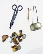 A small quantity of collectables to include:- military buttons, candle snuffers, a propelling