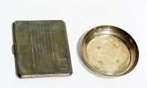 A silver cigarette case, with engine turned decoration, and sprung hinge, Birmingham 1947, 4ozs