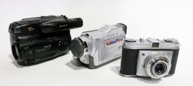 A selection of cameras to include:- Samsung VP-D20 digital camcorder, Kodak Retinette film camera,