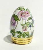 Elliot Hall enamel and gilt metal egg, Hellebore pattern on a cream ground, painted by S Selby and