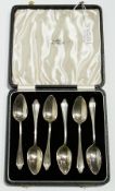 A set of six George V silver grapefruit spoons, Birmingham 1934 in a fitted case