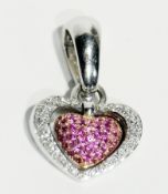 18ct gold Chimento diamond and pink sapphire heart pendant, having inner pink sapphire set gold