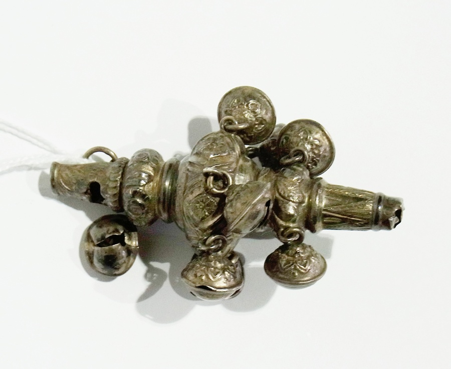 A Victorian silver baby's rattle with bells, whistle and suspension ring, Birmingham 1881 and one