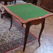 1930's oak card table, with relief decoration on cabriole supports, 83cm wide when opened