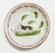 Antique delft/faience bowl, painted with rabbit and leaves, in brown and green, red foliate