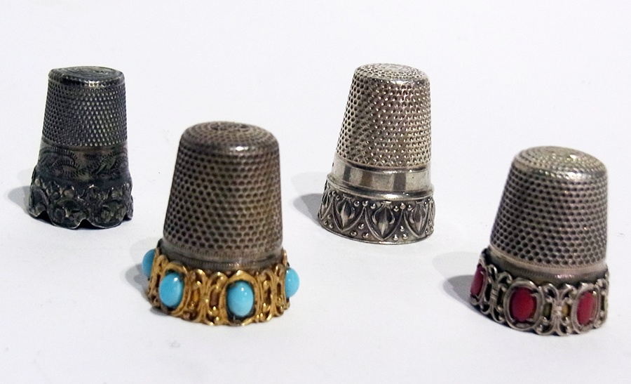 Two inset thimbles and two others, various designs (4)