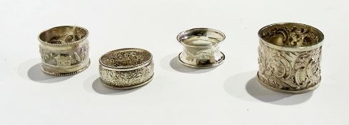 Three silver napkin rings, various, together with a foreign silver napkin ring (4)