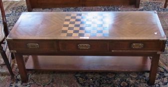 A modern oak games table/coffee table, rectangular on straight supports, 120cm wide