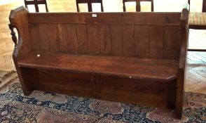 A stained pine church pew, 53cm wide