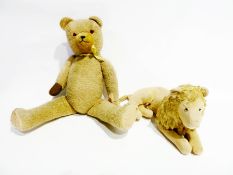Straw stuffed teddy bear, possibly German and a similar straw stuffed lion (af) (2)